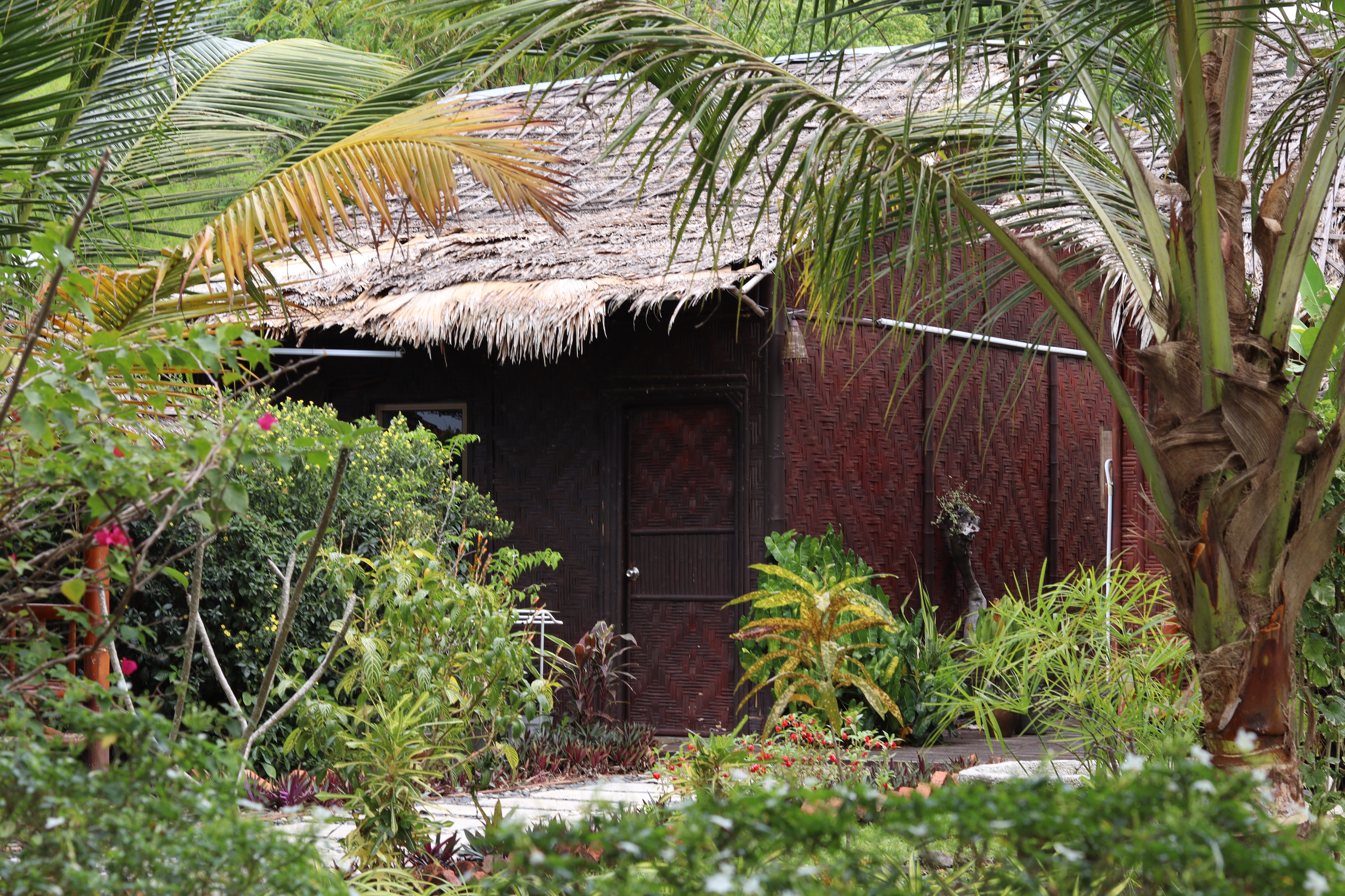 Bambu Villa exterior with tropical garden